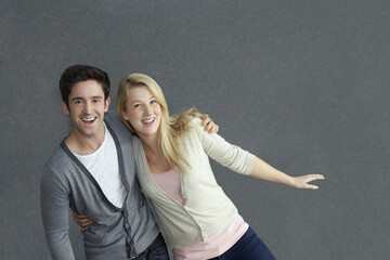 Man and woman posing for the camera