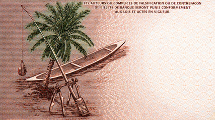 Dugout canoe, palm tree and a balancing perch pole. Portrait from Mauritania 200 Ouguiya 2006 Banknotes. Collection.. - obrazy, fototapety, plakaty