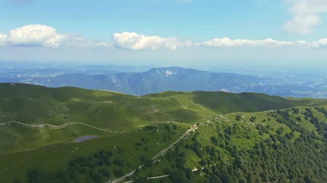 Flying Over The Lessinia Mountains
Beautiful aerial view of the mountains and hills of Monte Baldo in Lessinia Italy
