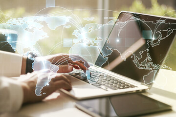 Abstract graphic digital world map with connections and hands typing on computer keyboard on background, globalization concept. Multiexposure