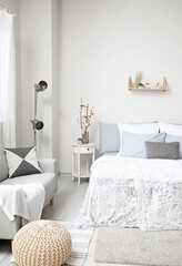 Fototapeta na wymiar Stylish interior of modern bedroom
