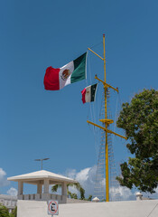 Mexican flag on a sailing mast in Chetumal, Mexico