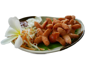 Picture of Fried Sausage Isolates
Garnish the dish with white plumeria flowers with sauce