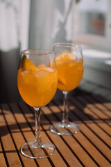 Summer citrus cold alcohol drink Aperol Spritz, closeup. 