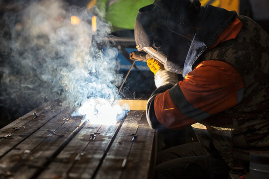 Shielded metal arc welding. The process is versatile and can be pherformed with relatively inexpensive equipment, making it well suited to shop jobs and field work.