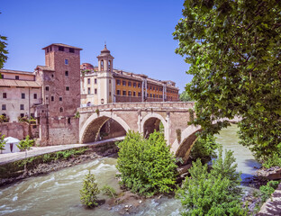 Rome Italy, view of Tiber island, bridge Fabricio and Caetani fortress tower