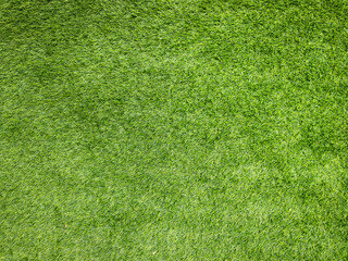 Fototapeta na wymiar Green Artificial Grass. Artificial Turf Laying Background Texture.