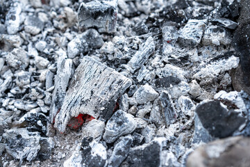 Coals and ashes from a fire
