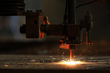 Cnc oxy - fuel cutting machine. Typical materials cut with a plasma torch include steel. - obrazy, fototapety, plakaty