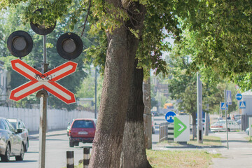 traffic light at a railway crossing on the road