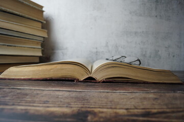 old books on wooden table