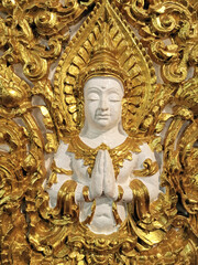 Thep Phanom cement plastered in the walls of Thai temples