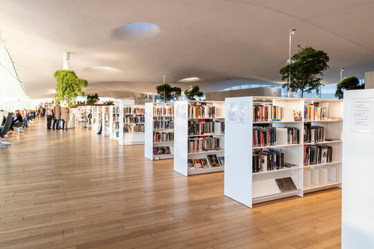 HELSINKI, FINLAND - JANUARY 05, 2020: Helsinki Central Library Oodi, living meeting place with range of services in modern design in city center. Interior inside with glass windows, wooden facade