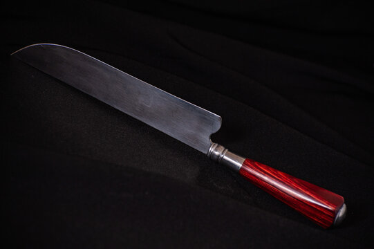 kitchen knife on a black background