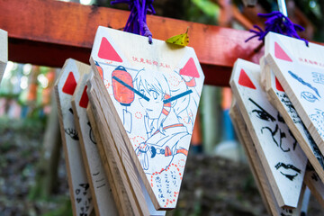 KYOTO, Japan. Modern manga style Ema, small wooden plaques, in which Shinto and Buddhist...