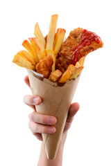 Hand is holding a paper cone full of appetizing fish and fries