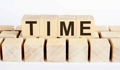 TIME word from wooden blocks on desk, search engine optimization concept