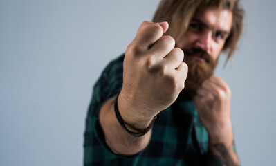 concept of conflict. Confident and handsome brutal man. Facial care. Mature hipster with beard....