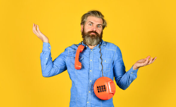 Retro phone. Marketing automation. Cold Calling Scripts. Outdated technology. Manager phone dialog communication. Answering machine. Bearded hipster man phone conversation. Successful negotiations