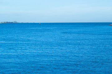 wave of blue ocean on sandy beach. Background.