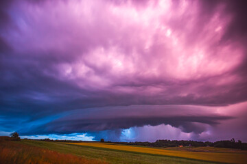 Obraz na płótnie Canvas Supercell storm clouds with intense tropic rain