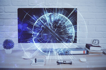 Double exposure of business theme icons and work space with computer background. Concept of success.