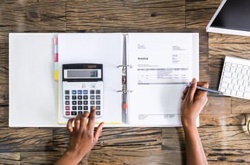 African American Auditor Or Advisor Doing Accounting