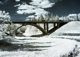 mystical  landscape with a bridge, infrared photography. our beautiful world in the spectrum of...