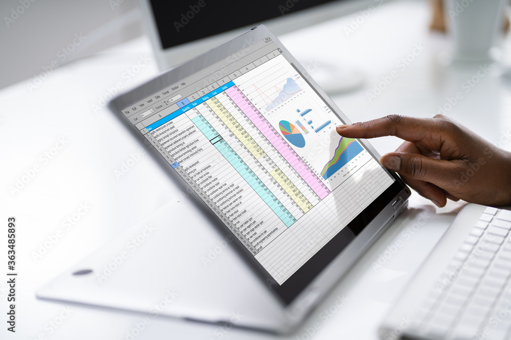 Poster financial analyst using spreadsheet software