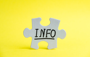 Puzzle piece with INFO text it stands on a bright yellow background. Symbol of association and...