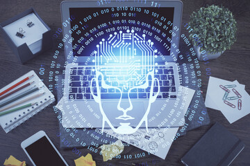 Multi exposure of work space with computer and human brain hologram. Brainstorm concept.