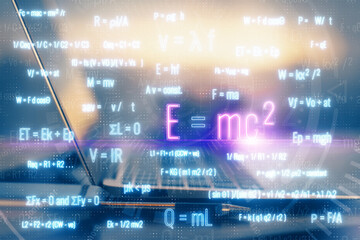 Desktop computer background and formula hologram writing. Double exposure. Education concept.