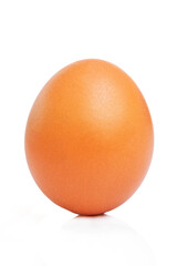 Bright brown egg. Close-up. Isolated on a white background. Vertical. Diet and proper healthy nutrition. Vertical.