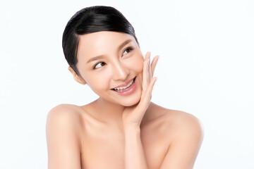 Obraz na płótnie Canvas close up Beautiful Young asian Woman touching her clean face with fresh Healthy Skin, isolated on white background, Beauty Cosmetics and Facial treatment Concept