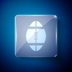 White Rugby ball icon isolated on blue background. Square glass panels. Vector Illustration.