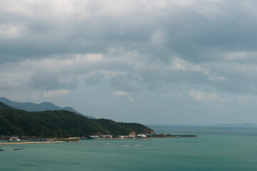Clouds move over the harbor. cloudscape over the sea in Vietnam, Nha Trang.