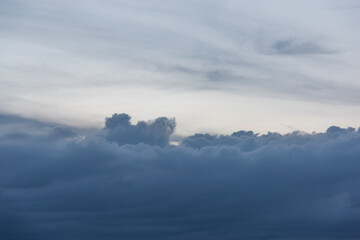 Fototapeta premium Horizontal landscape of beautiful blue dark clouds in the sky