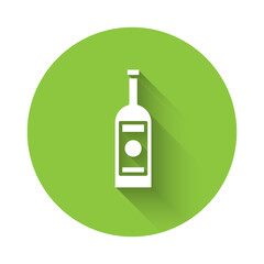 White Glass bottle of vodka icon isolated with long shadow. Green circle button. Vector Illustration.