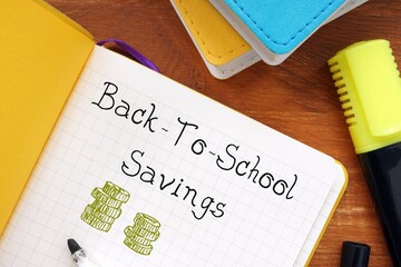 Business concept meaning Back-To-School Savings with phrase on the piece of paper.