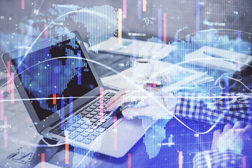 Multi exposure of businessman working on laptop on background. International business hologram in front. Concept of success.