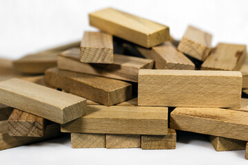wooden tower bricks game/ stack of bricks from fallen tower