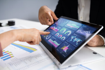 Financial Analyst Using Convertible Laptop Screen