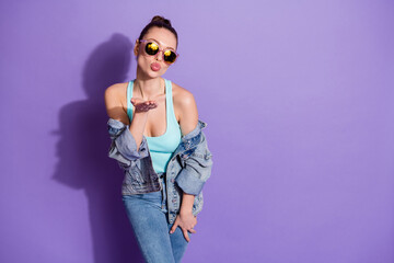 Portrait of dreamy attractive girlfriend enjoy 14-february date send air kiss boyfriend wear denim street style clothes isolated over violet color background