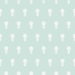 Seamless camomile flower pattern. Pale sage green background with white blossoms