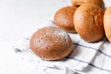 Fresh baked buns on bright background