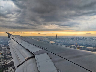 Fototapeta na wymiar Aerial view of city from an airplane window