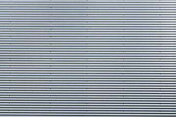 Corrugated metal sheet. New and Modern silver grey background pattern.