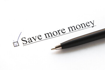 a piece of paper with the inscription save more money from to do list with a tick 