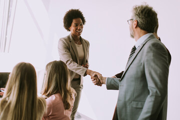 Fototapeta premium Group of young multiethnic business people working on new project