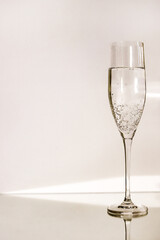 beautiful isolated wine glass on a light geometric background